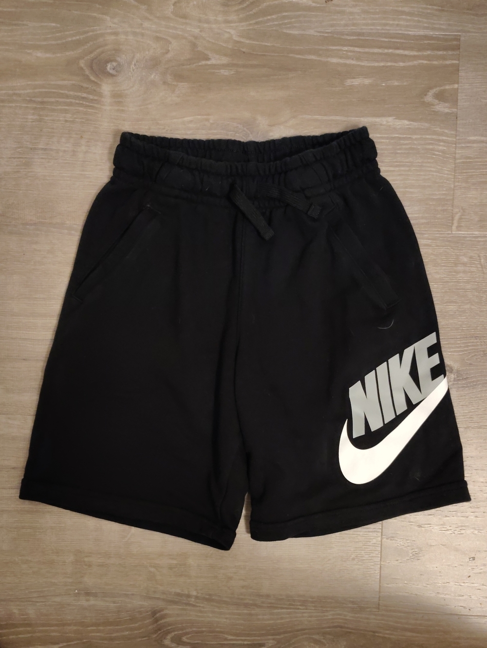 Nike Teen Black Shorts with White Swoosh Logo